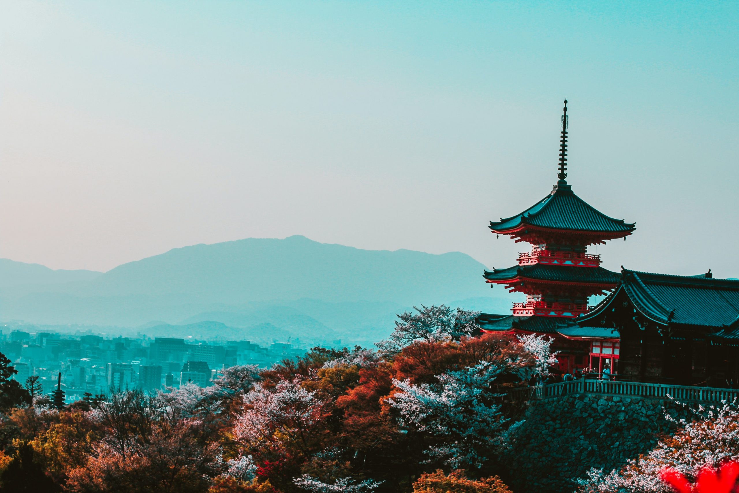 red-and-black-temple-surrounded-by-trees-photo-402028